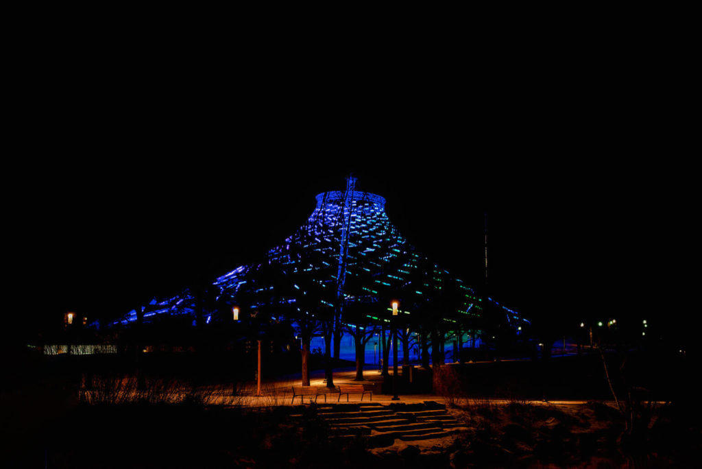 Riverfront Park Pavilion at night with Seahawk blue and green lights