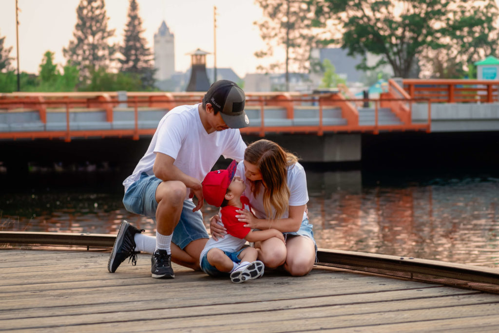 Mother, father and young son on the walkway at Riverfront Park