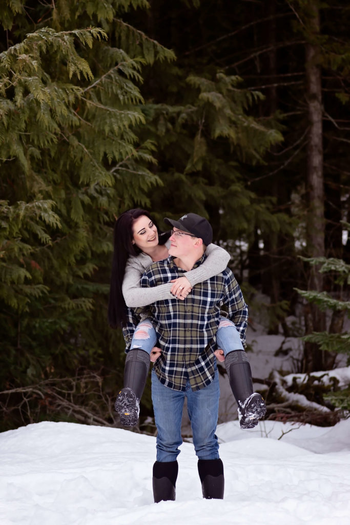 Man looking at his girlfriend during the perfect family photography session.