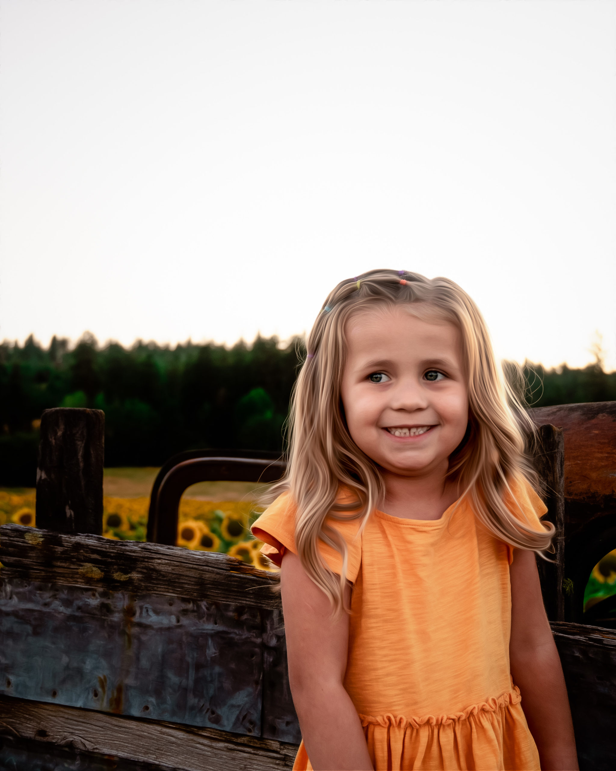 little girl smiling in a gold shirt things to do in spokane with kids