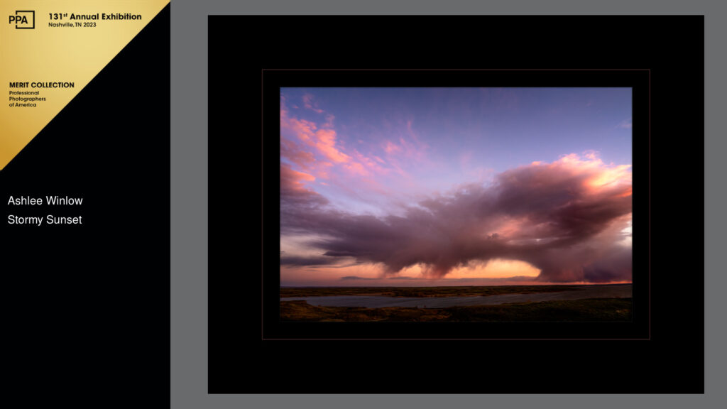 Cotton candy colored clouds arc over a river on the Washington Scablands